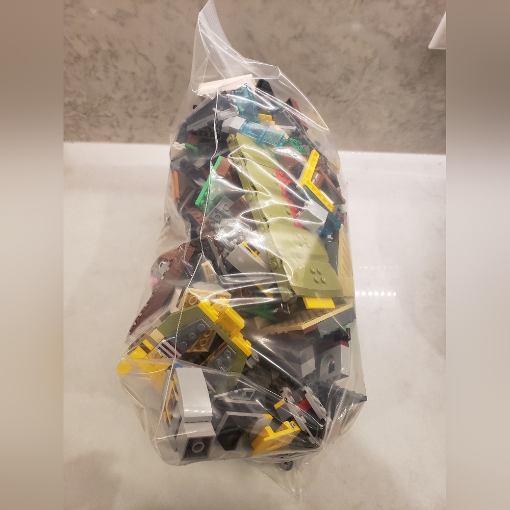 Large bag of LEGO (may include Toy Story, Minecraft, Ninjaro, Ninja Turtle)